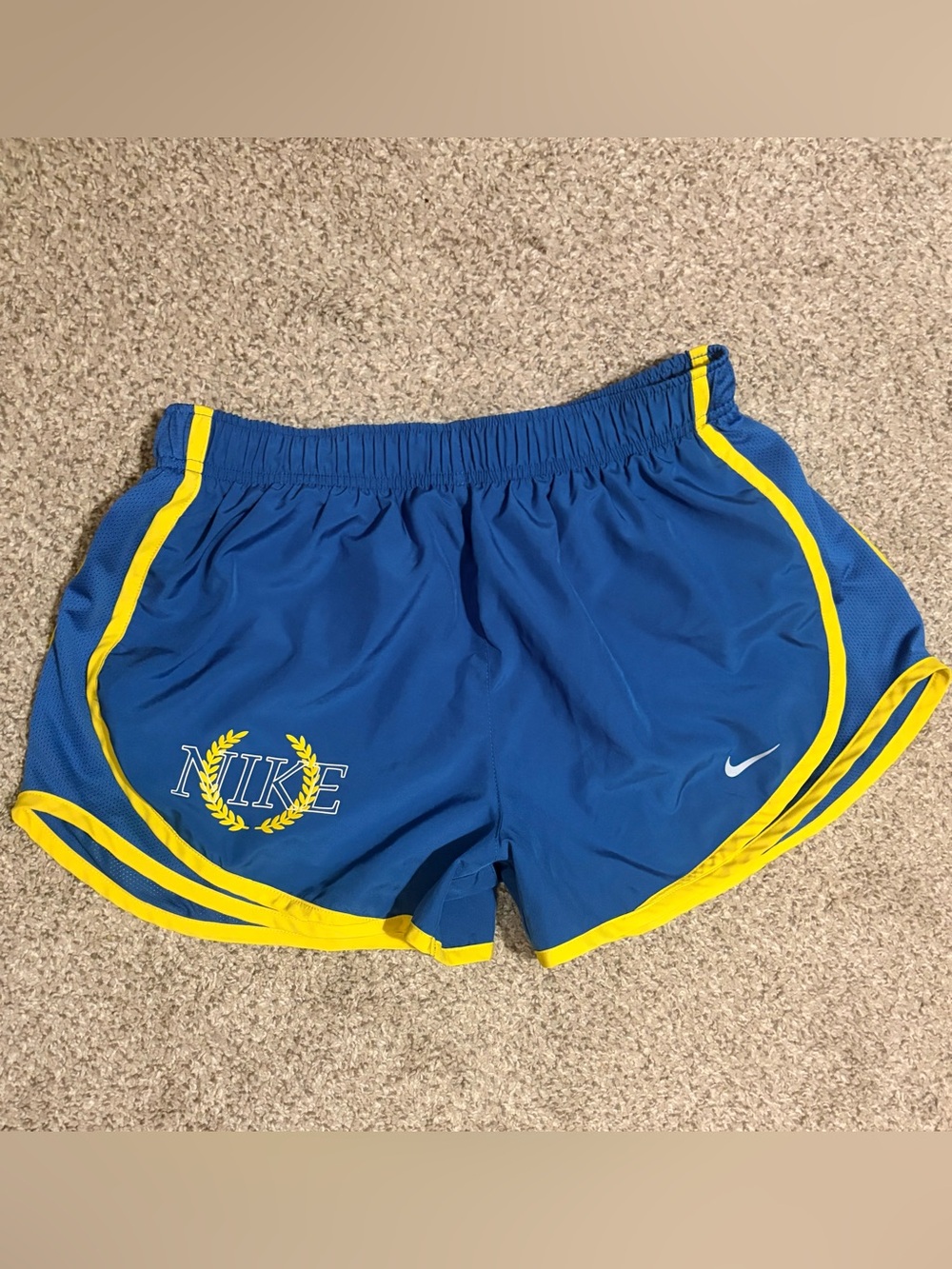 Nike Women’s Royal Blue Athletic Shorts with Yellow Trim